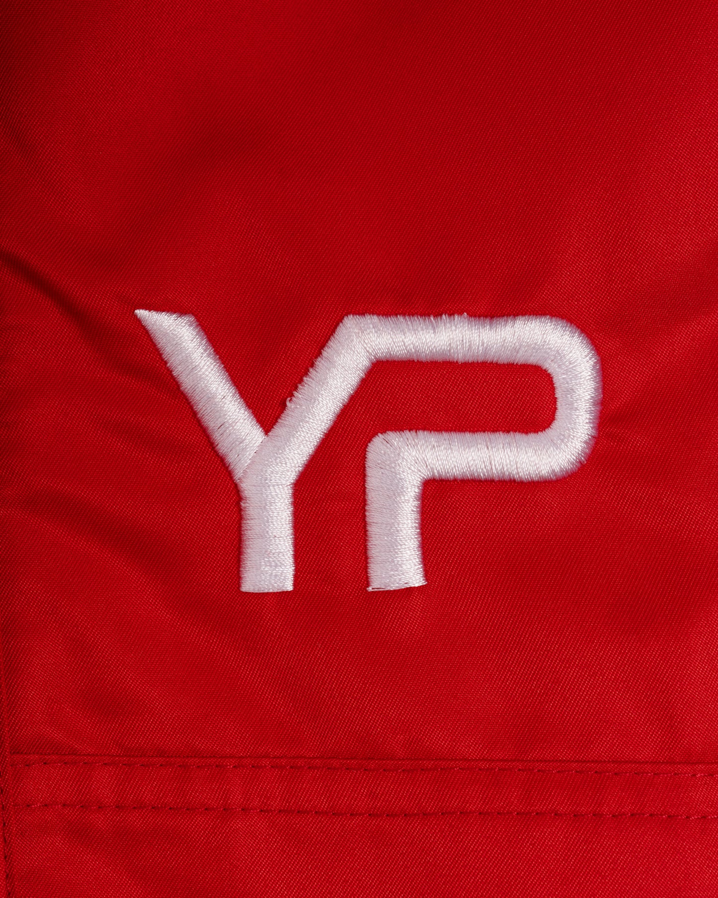 YP OVERSIZE STACKED RED TRACKPANTS